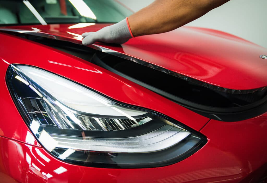 Red Tesla paint protection film in Charlotte, NC (Tesla PPF Near ME)