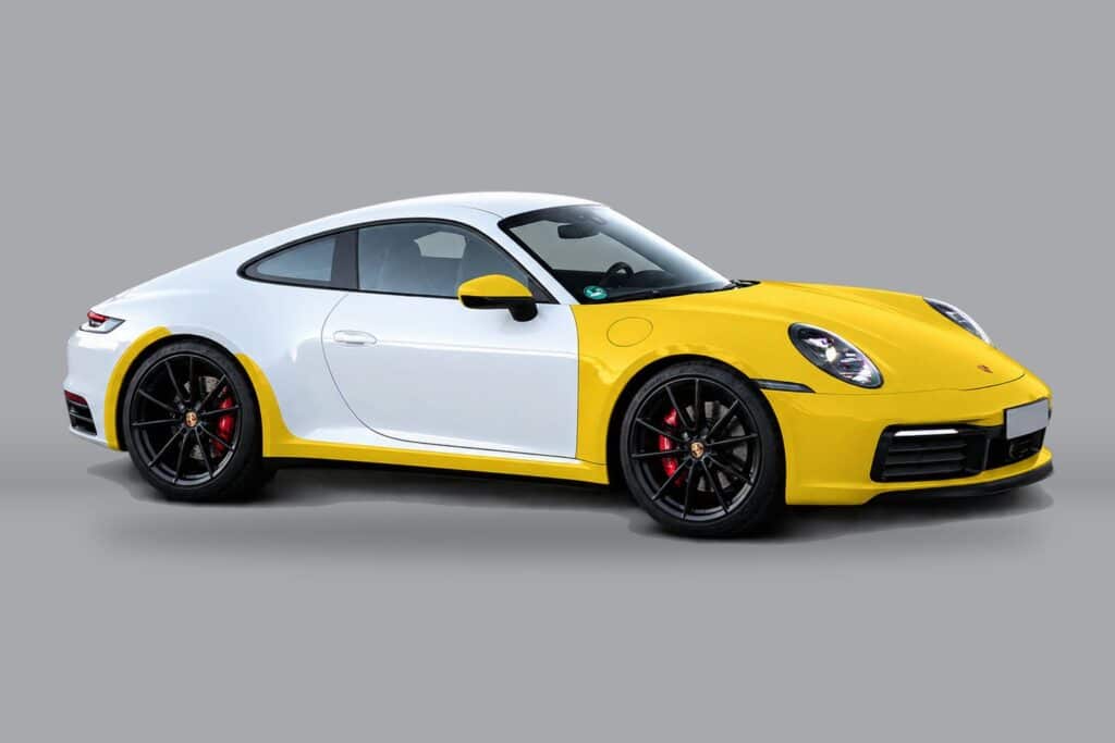 Porsche 911 with Full Front Plus paint protection film coverage, including rocker panels and rear wheel impact areas