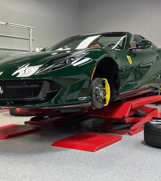 Wheels off for cleaning and ceramic coating on yellow calipers and wheels